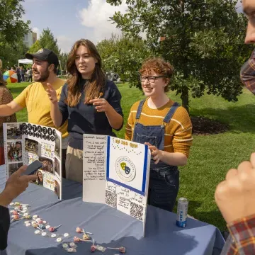 students exploring student orgs at outdoor event 